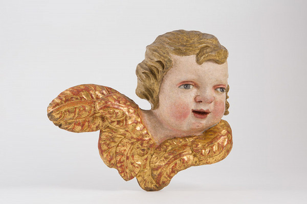 Slovenský rezbár z 2. polovice 18. storočia – Hlava anjela s krídlami 