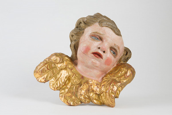 Slovenský rezbár z 2. polovice 18. storočia – Hlava anjela s krídlami 