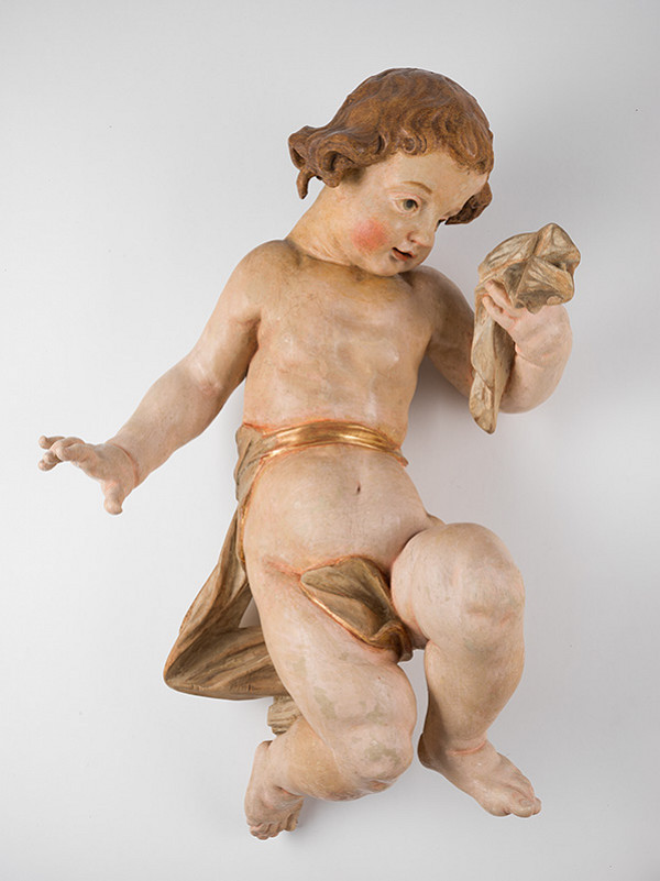 Rakúsky rezbár zo začiatku 18. storočia, Stredoslovenský rezbár z 18.storočia – Putto z ľavej strany oltára 